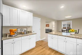 Tons of storage space throughout the kitchen (full size pantry not shown)