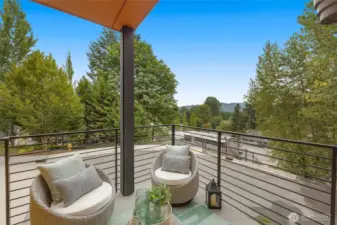 Mornings with a book, evenings with a glass—your private deck is an open invitation to breathe deeper. (photos of model home)