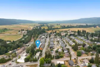 Beyond the rooftops lies your backyard: rolling hills, river walks, and mountain-bound weekends.