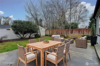 Lovely private back yard. We virtually added outdoor furniture.