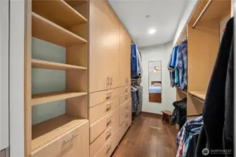 Primary bedroom with custom closet.