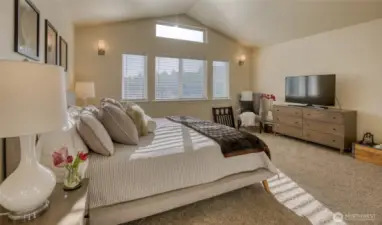 You'll enjoy waking with the sun from this primary bedroom that is East facing.