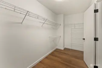 Oversized walk-in closet in primary