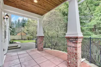 View of your patios out of the huge kitchen/dining room patio doors. Real sanctuary back here, so private and plenty of birds singing for you.
