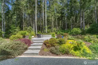 A new raised stone patio was recently installed. Set amongst the native woods, this patio gets lots of sunshine.
