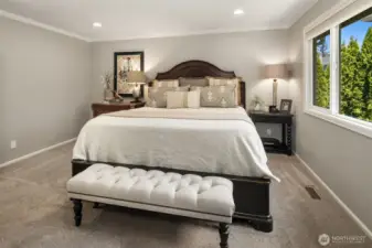 Plenty of room for your king sized bed and end table. Builder John Buchan thinks of everything and has crown molding to complete the room.