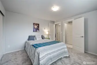 Primary has access to bath & utility room across the hall,