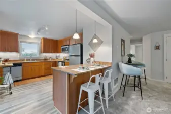 Eat-in, vinyl plank, granite, beautiful millwork- all updated.