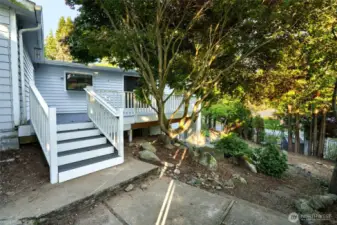 Main level access from deck to back yard