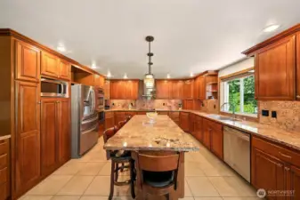Ample Countertop Space with Island for Extra Seating and Storage