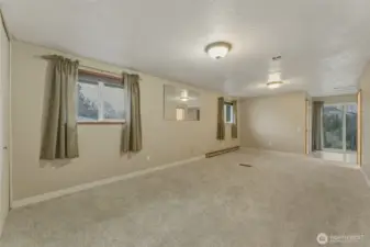 Primary Ensuite with Balcony Overlooking the Pool.