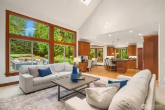 Views of private patio, lush landscaping, and hanging lights create a peaceful and magical backdrop to this beautiful home.