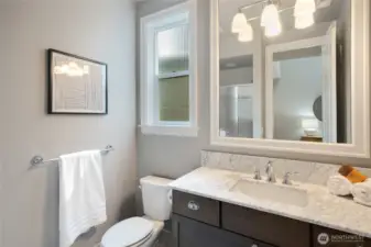 3/4 bathroom with shower on main level.