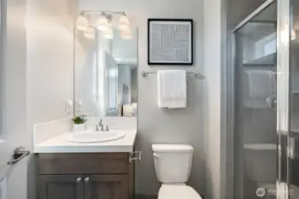 En suite bath for the bedroom suite.