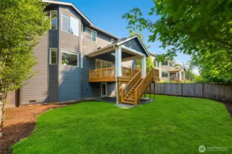 Fully fenced backyard, and a tall crawl space for easy access and additional storage for a gym or wine cellar.
