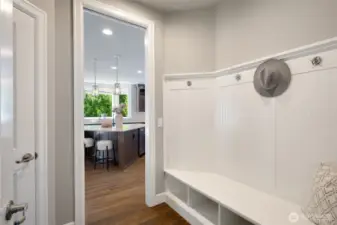 Built-in mudroom bench, convenient storage spaces, and a huge luggage room!
