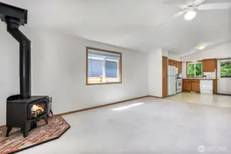 Open Living room leading to Kitchen.