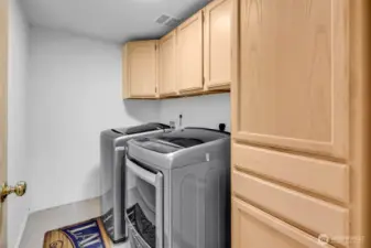 Laundry room with storage