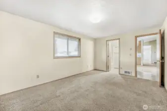 The primary bedroom has an ensuite full bath...