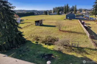 The pasture features a single stall barn that can be fixed up to house a horse.
