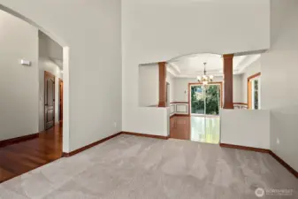 Formal living room looking into formal dining area