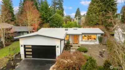 Updated backyard: Pressure cleaning on the hard-scapes, new sod, new plantings, new fence.  Landscape lighting too!