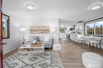 A cozy living room off the entryway welcomes you to this beautifully updated rambler.