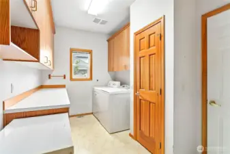 Utility room off of the kitchen/eating space.