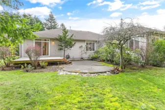 Nice backyard that backs up to the trees with mature landscaping.