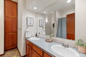 Full bath with double sinks.