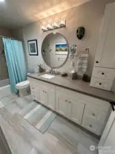 Updated bathroom with tub located on the upper level