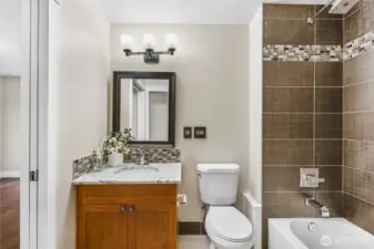 Large bathroom with access from hallway and bedroom