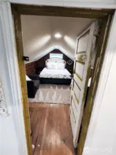 Off to the right of the seating area is the second bedroom.