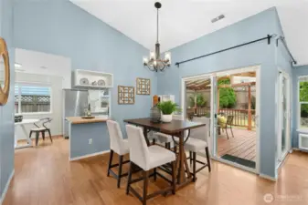 The dining room is open to the kitchen with easy access to the covered deck.