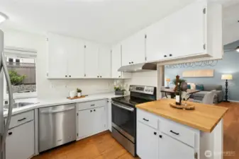 Another view of the kitchen and how it opens to the dining and living rooms.