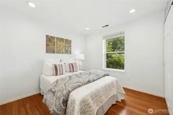 First of the 3 bedrooms. Notice the wood floor throughout.