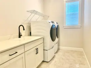 Washer and Dryer with utility sink and cabinets