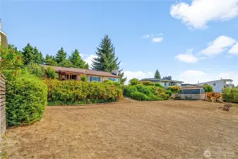 Spacious view parcel with a charming home offers endless potential.