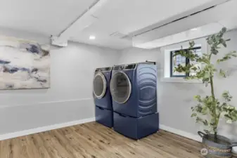 Large laundry + storage space downstairs!
