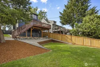 Huge backyard with fresh landscaping is ready for your gardening dreams!