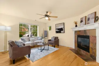 Main level family room with cozy gas fireplace.
