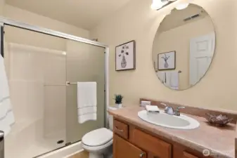 Full bath with low-rise shower on the main level.  Perfect for multigenerational living.
