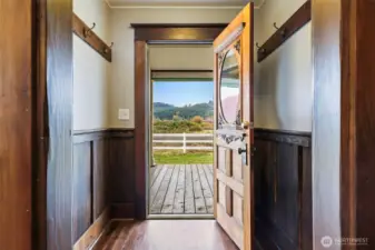 Entry, facing from living room towards outside