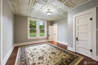 Downstairs bedroom, enter the parlor or the ensuite bath from this room