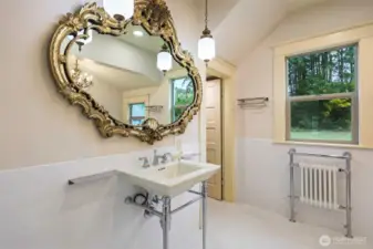 Radiant heat/ towel warmer.  Thermostat can be adjusted on your phone even if you're away from home.  Ultimate in heritage styles & modern convenience.