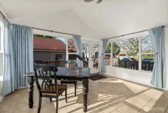Sun Room- light and bright leading to outbuildings and back of property.