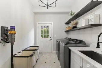 Laundry room with backyard access