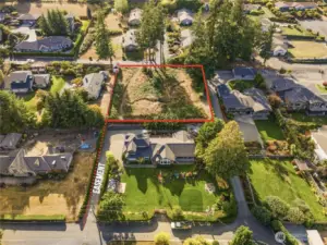 There is an access easement across the subject property and between the two homes below (on 27th) for 10' wide right of way and easement (see title).