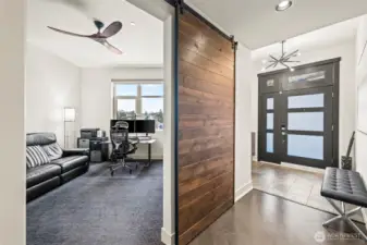 Large den/study/office off entry with barn door for privacy...