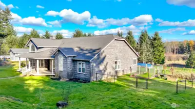 Fenced side yard & back, view of the garden area